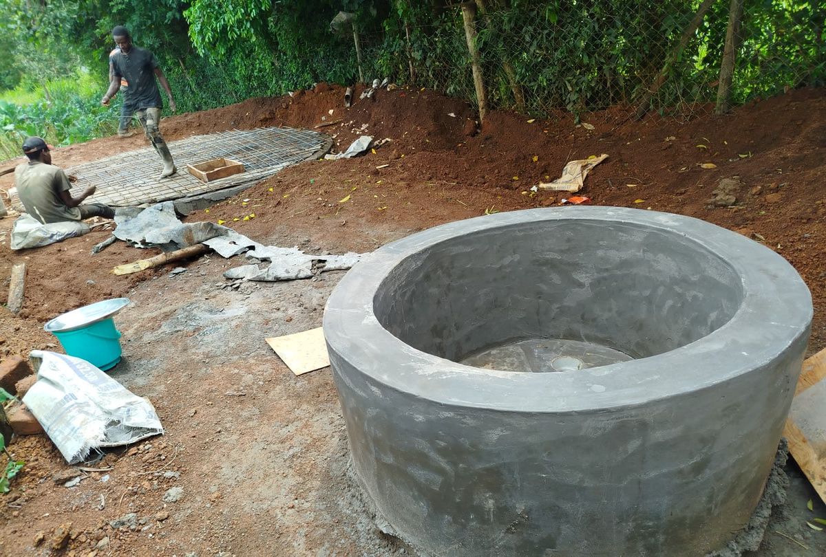 Concrete digester ring under construction beside the foundation