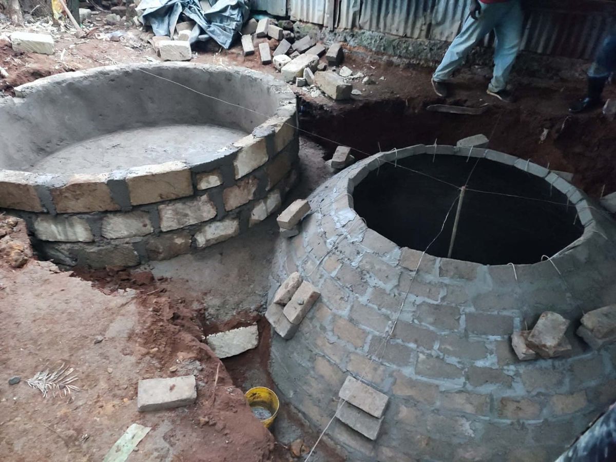 Two brick digesters under construction